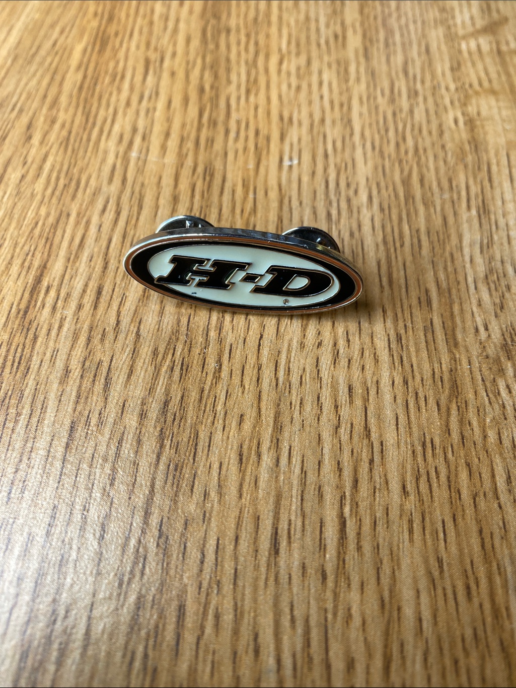 Vintage Harley-Davidson Oval Lapel Hat Pinback Black White Orange Enamel Front